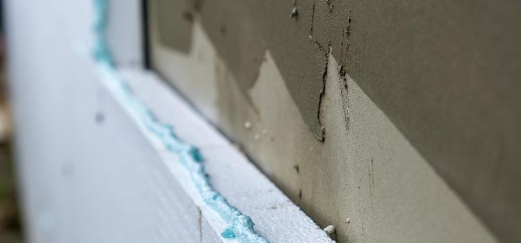 Hőszigetelés rendszer rétegrend és ragasztás részlet hőszigetelés rendszer rétegrend ragasztás közeli részlet